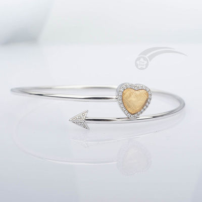 Un météorite, un bracelet, un cœur, une flèche de Cupidon, un bracelet de 58 mm de diamètre.